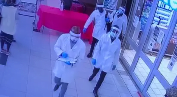 SHOCKING: Armed Robbers Dressed As Health Workers Rob Supermarket.