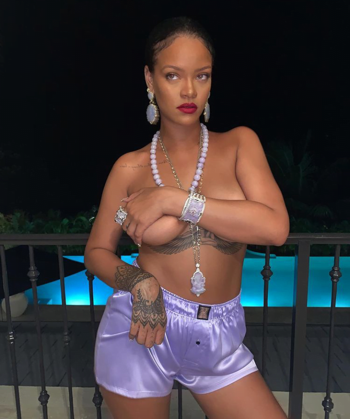 Rihanna Accused Of Disrespecting A Religious Pendant In A Topless Photo